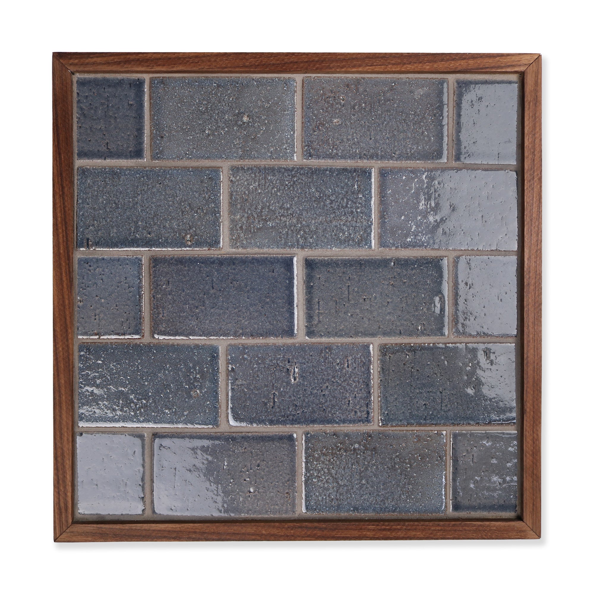 Cascadia Ceramic Tile Shown In Squall with Glossy Finish