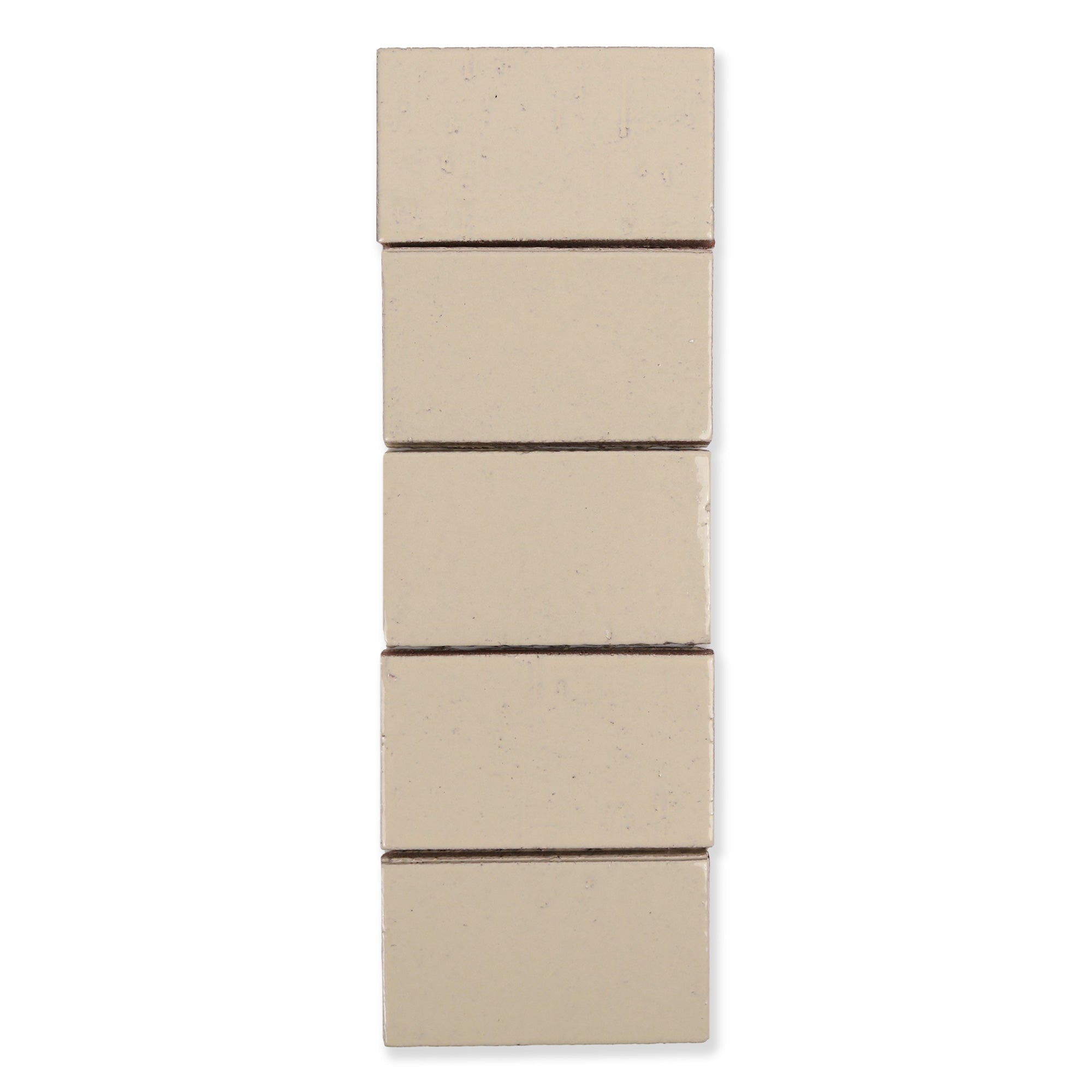 Cascadia Ceramic Tile Shown In Sand with Glossy Finish
