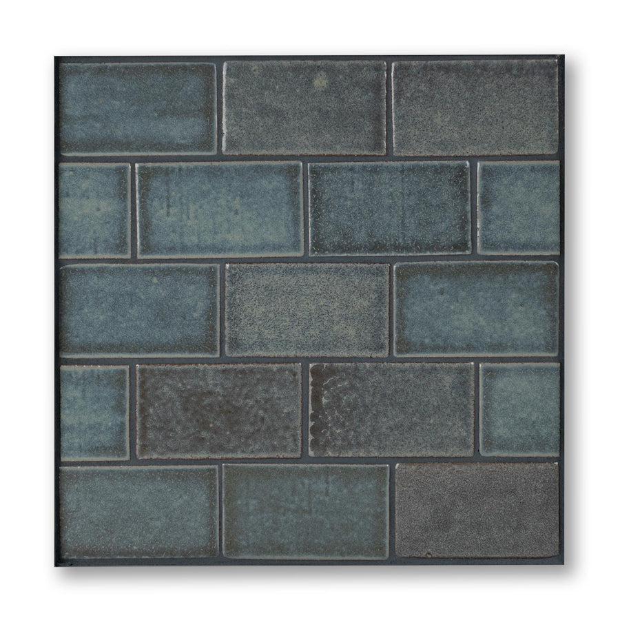 Pattern of blue tiles on a white background
