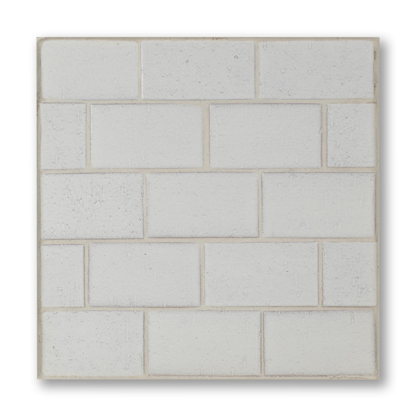 Square tile with a grid pattern on a white background